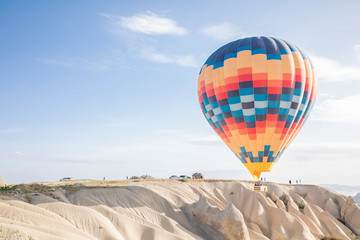 colourful hot air balloon floating over the valley in Turkey, Cappadocia 