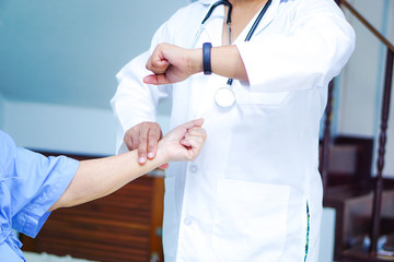 Doctor check and help Asian elderly woman patient with love, care, helping, encourage and empathy...