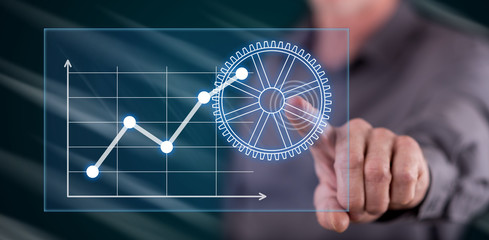 Man touching a digital business analysis concept