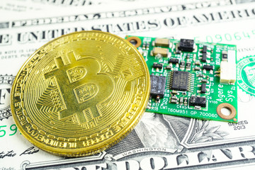 A golden bitcoin on computer circuit and US dollar. Finance Electronic Technology Account, Statistics, Investment Analytic research data economy, Stock exchange trading, office Business company.