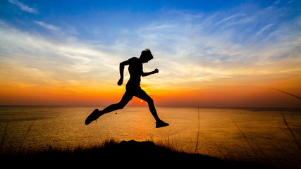 Men are running for good health at sunset.