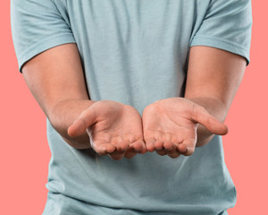 young man holding something