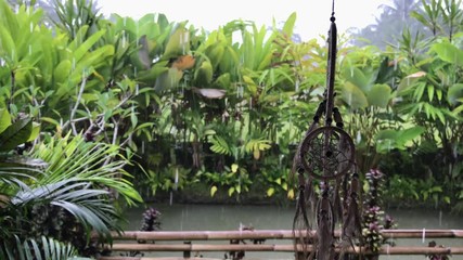 Dreamcatcher at luxury balinese villa. Raining season. Rain drops. Nature background. - Powered by Adobe
