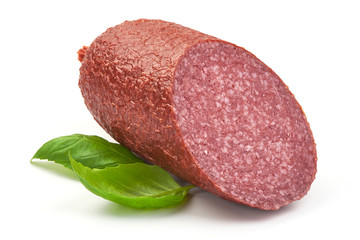 Salami smoked sausage with basil, close-up, isolated on white background