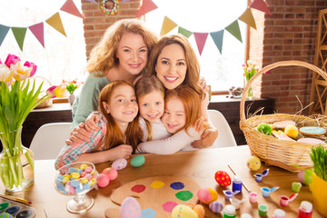 Portrait of nice cute sweet lovely attractive cheerful optimistic girls embracing cuddling gathering spending event custom decorative elements festive together in house brick loft industrial interior