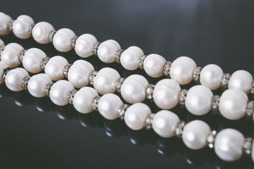 Pearls on a black isolated background