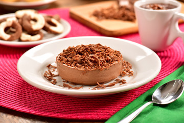 Individual chocolate pie on decorated scene