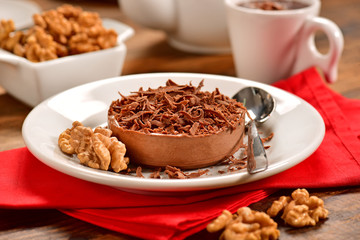 Individual chocolate pie on decorated scene