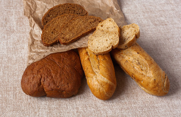 bread ciabatta slices food background brown paper canvas wheat bran graine yeast leaven