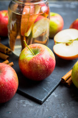 Apple and cinnamon detox drink in jar. Selective focus.