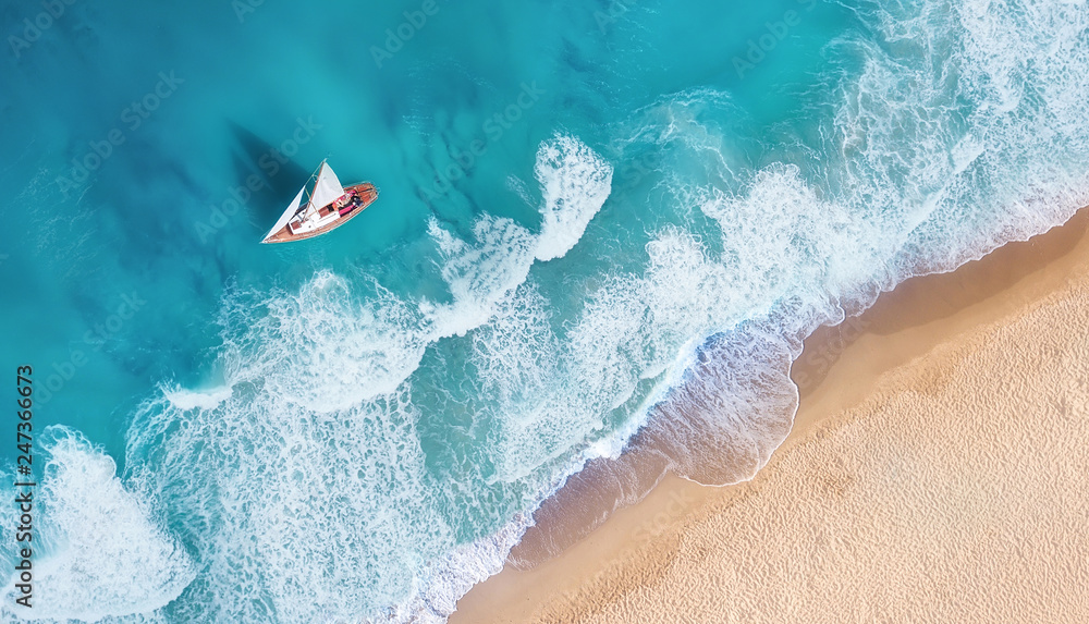 Canvas Prints waves and yacht from top view. turquoise water background from top view. summer seascape from air. t