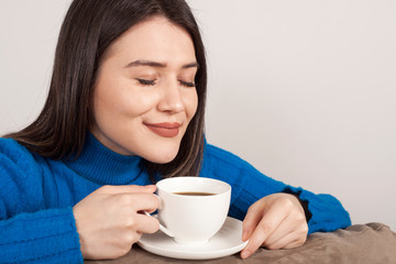 beautiful young woman drink coffee