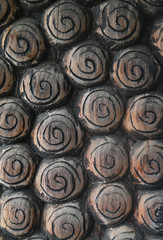 Closeup of handmade teak wood with sunlight. The natural art background and template. Vertical view. 