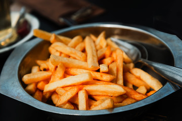 Golden French fries potatoes ready to be eaten