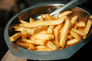 Golden French fries potatoes ready to be eaten