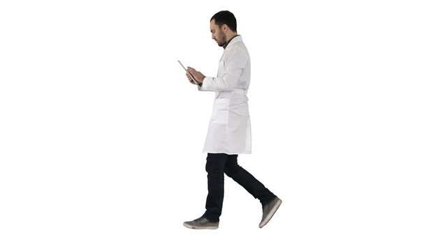 Doctor using tab while walking on white background.