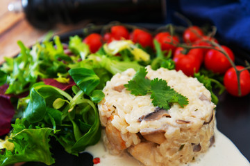 risotto with fresh cream, salted chicken, rehydrated ceps and mushrooms