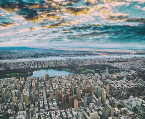 Aerial view of Manhattan skyline from the sky on a cloudy day, New York City