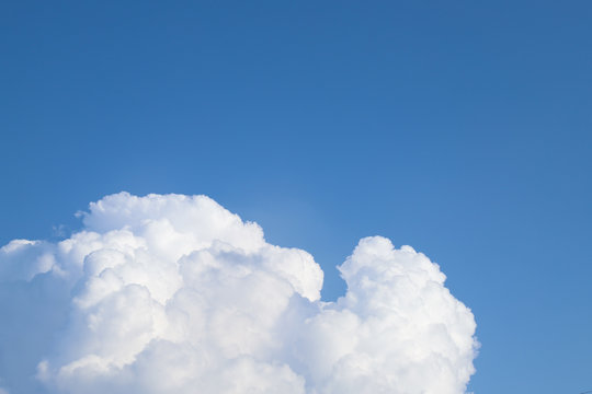 Scenery of blue sky with white clouds in sunny day. The natural art background and template. 