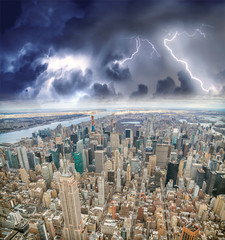 Aerial view of Manhattan skyline from the sky on a cloudy day, New York City