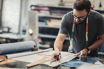 Fashion designer working in his studio