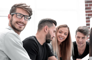 Charming men looking at camera with a smile