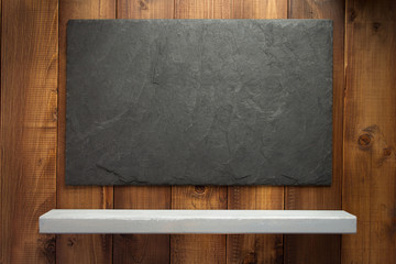 slate stone at wooden background