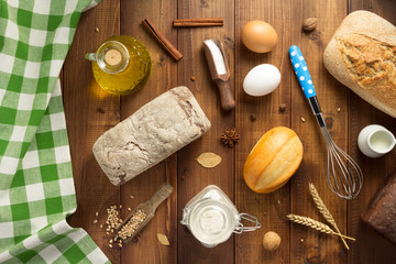 bread and bakery ingredients on wood