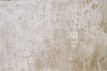 Old white grungy wall background or texture