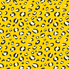 Yellow leopard print. Seamless animal fur texture.