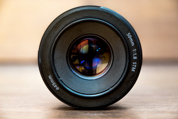 Lens for camera on blurry background. Professional photography equipment_