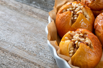 Baked delicious apples with granola. Healthy eating option