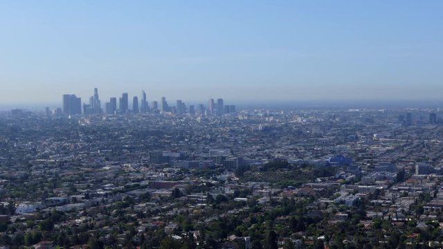Ultra wide angle view of Los Angeles, California, United States of America. Famous American city on US West Coast as seen from Griffith Observatory. Urban view with buildings, streets, sky, landscape