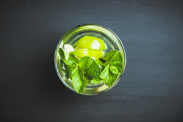 Lime and mint drink glass. Selective focus.