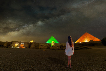 Giza pyramids and Sphinx light up at night - obrazy, fototapety, plakaty