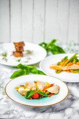 delicious dinner of chicken fillet with vegetables