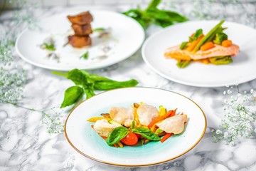 delicious dinner of chicken fillet with vegetables