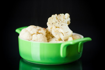 boiled cauliflower with spices in a bowl