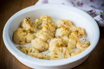 baked cauliflower with spices in ceramic form