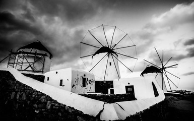 Small windmills in black and white at Mykonos, Greece