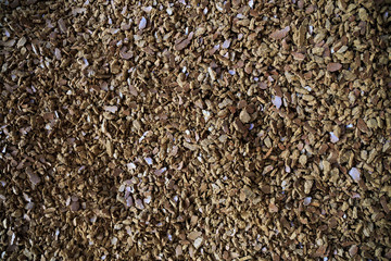 Granules of rape cakes in the agricultural factory for the production of rapeseed oil.