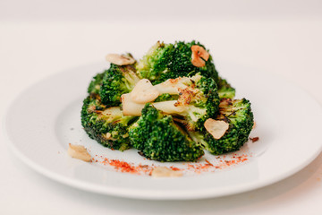 European international fusion cuisine, a beautiful dish on a white plate decorated with herbs and...