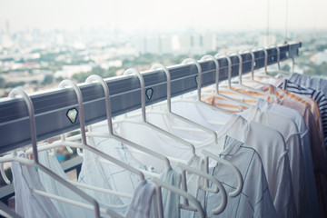Drying clothes on clothesline on condo in morning.housework and cleaning concepts