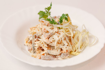 European international fusion cuisine, a beautiful dish on a white plate decorated with herbs and vegetables. a professional chef has prepared a delicious meal.