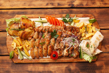 European international fusion cuisine, a beautiful dish on a white plate decorated with herbs and vegetables. a professional chef has prepared a delicious meal.