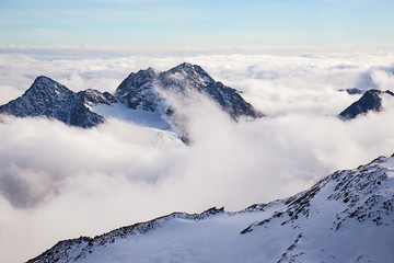 Fototapeta na wymiar Auf dem Berg, über den Wolken