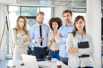 Group of multi ethnic business people posing in office. Start up business concept.