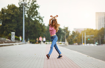 Happy woman walking  during  on the streets.