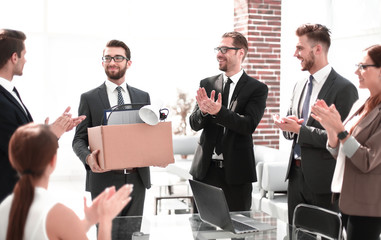 business group welcomes the new employee with applause