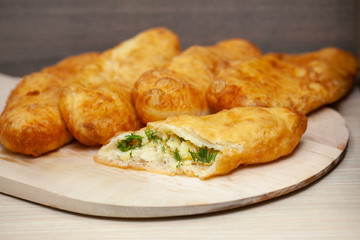 Hotcakes with fill, traditional English Georgian khachapuri Russian appetizer